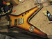 Single coil size sustainer has fake metal plate to hide void in humbucker cavity